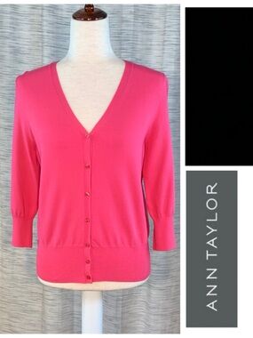 Ann Taylor solid pink cardigan sweater.